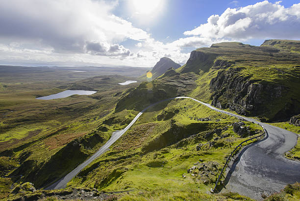A sunny morning on the road towards Quiraing, Trotternish Peninsula. At the top of the hill viewing Loch Cleat.