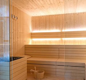 Empty interior of traditional Finnish sauna room. Modern wooden spa therapy cabin with hot dry steam